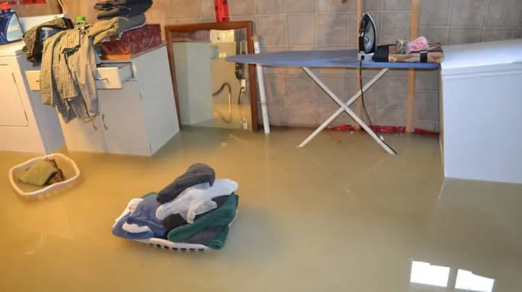 Flooded Big Lake, MN basement being pumped and dried
